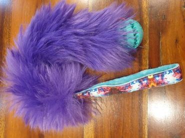 faux fur handle with bungee and tooth brush ball