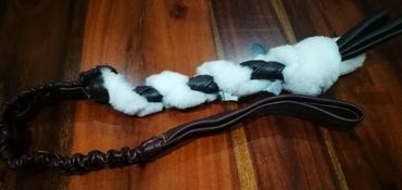 leather and sheep skin plait with long handle