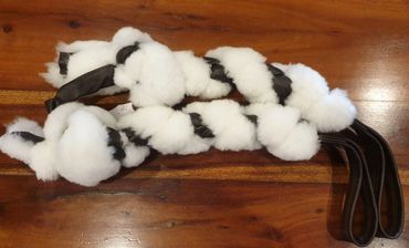 leather and sheep skin plait with short handle