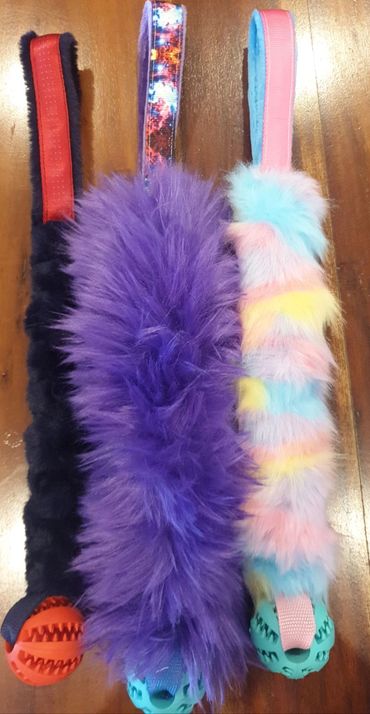 faux fur handle with bungee and tooth brush ball