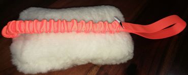 long handled orange bungee sheep skin tug