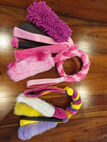 examples of fleece plait with tubular handles and various tentacles including mop