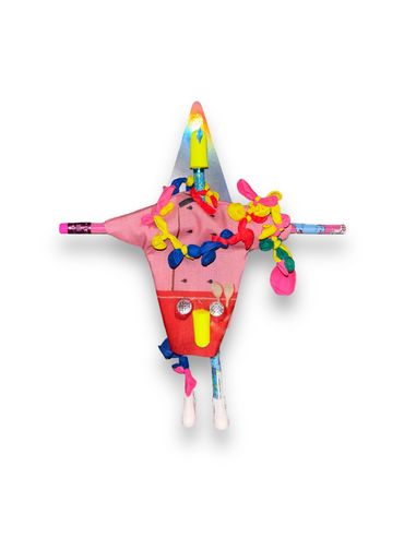 Colorful abstract sculpture with playful shapes and textures on a white background.