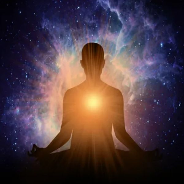 Silhouette meditating with glowing heart in cosmic space.