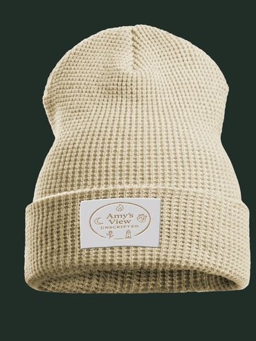 Beige knit beanie with Amy's View label on cuff.