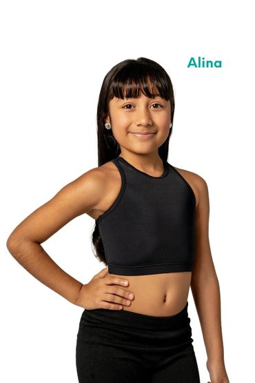 Young girl named Alina posing confidently in black athletic wear.