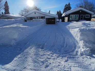 snow removal driveway sault ste marie clean cleared driveway after heavy snowfall