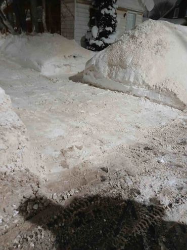 snow removal end of driveway sault ste marie plow pile cleared heavy snow residential