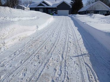 snow blowing driveway sault ste marie clean cleared driveway winter snow removal service
