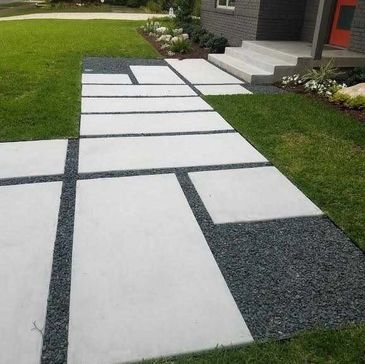 Walkway designed and constructed with pavers and gravel.