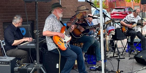 Musicians playing Carleton Place Porchfest 2025
