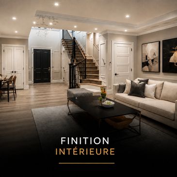 Elegant, modern living room with staircase and warm lighting.