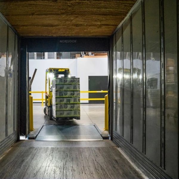 Forklift Loading pallet on truck