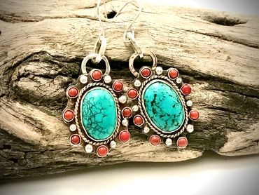 Red coral and Sterling balls surround these Kingman turquoise earrings.  