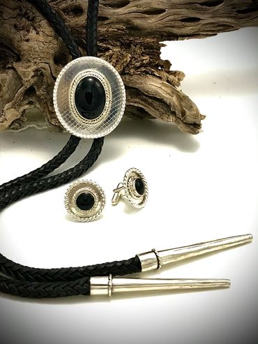 Black Onyx Bolo textured with real snakeskin and custom tips with matcing cufflinks.