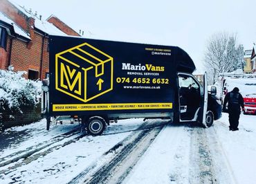 Mario Vans removal services van. Featuring professional services no matter the weather