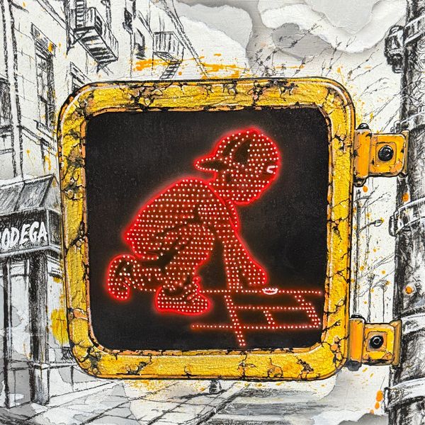 A graffiti of a red LED figure in a yellow frame on a street wall.