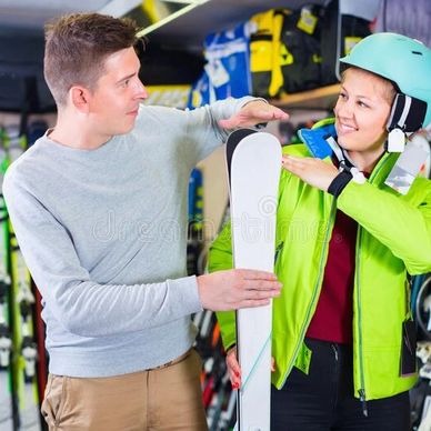 Ski salesman with customer