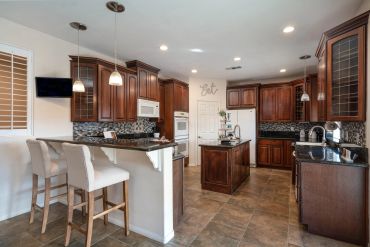 <img src=”kitchen-photo.jpg” alt="Real estate photography by Steve Heisler Photo">