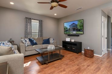 <img src=”living-room-photo.jpg” alt="Real estate photography by Steve Heisler Photo">