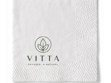 White napkin with VITTA logo and leaf design.