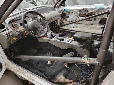 Custom chromoly roll cage in Foxbody Mustang 