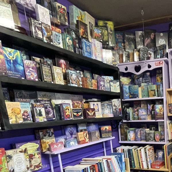 Enchanting display of oracle cards at a metaphysical shop.
