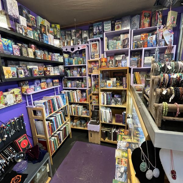 Enchanting display of spell books at a metaphysical shop.