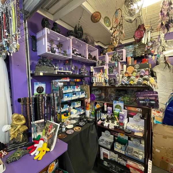 Enchanting display of magic candles at a metaphysical shop.