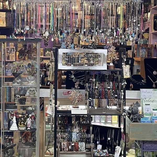 A curated selection of gemstone jewelry reflecting holistic and magical themes.
