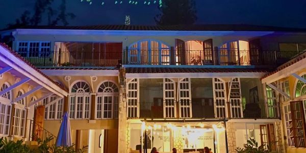 View of The Music Mansion from the pool at night.