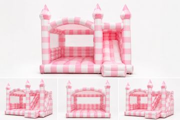 Pink and white inflatable bouncy castle with slide.