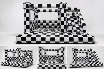 Black and white checkered inflatable obstacle course.