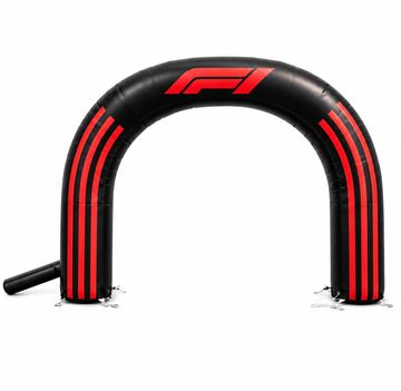 Black inflatable arch with red F1 logo and stripes.
