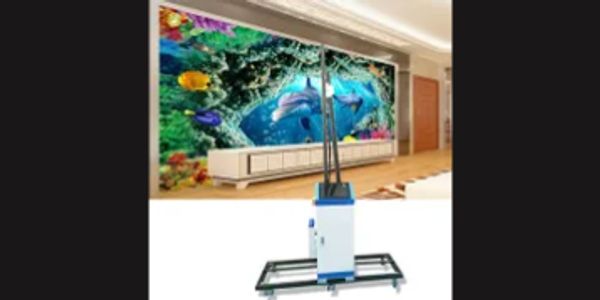Large wall mural printer creating an underwater-themed mural with dolphins and fish.