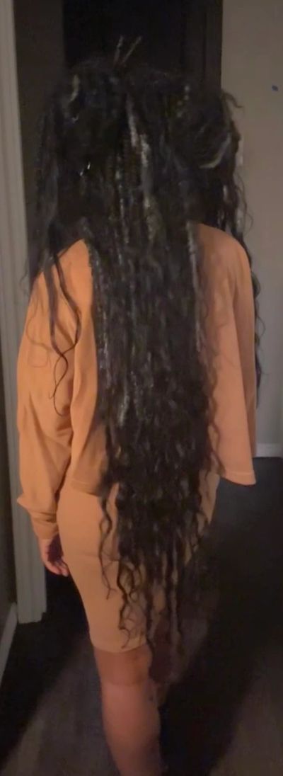 Back of customer hair showing Faux Locs 