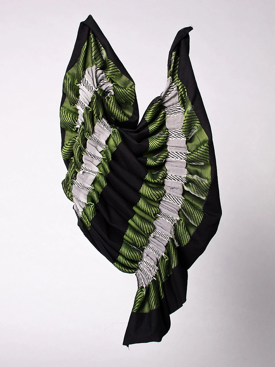 Textured black scarf with green and white ruched fabric design.