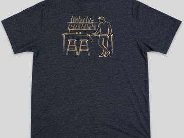 T-shirt with a simple bar scene illustration in gold.