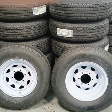 radial trailer tire, trailer tire and wheel, radial trailer tire and steel wheel assemblies, tire an