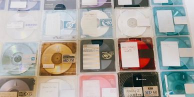 Collection of MiniDiscs ready for digital transfer to preserve your favorite audio memories