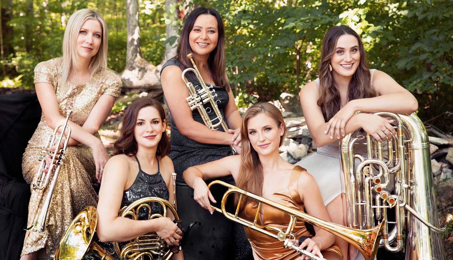 Members of Seraph Brass Ensemble outdoors holding their instruments