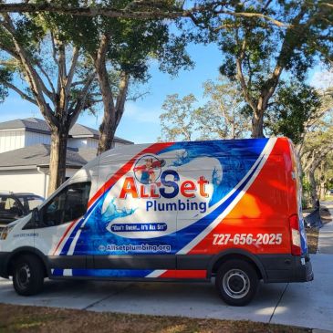 All Set Plumbing service van parked outside.