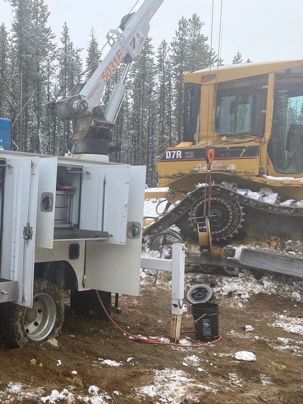 Removing a final drive from a CAT D7 in northern British Columbia