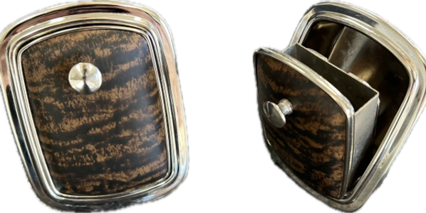 Vintage metal and wood cigarette case with a hinged lid.