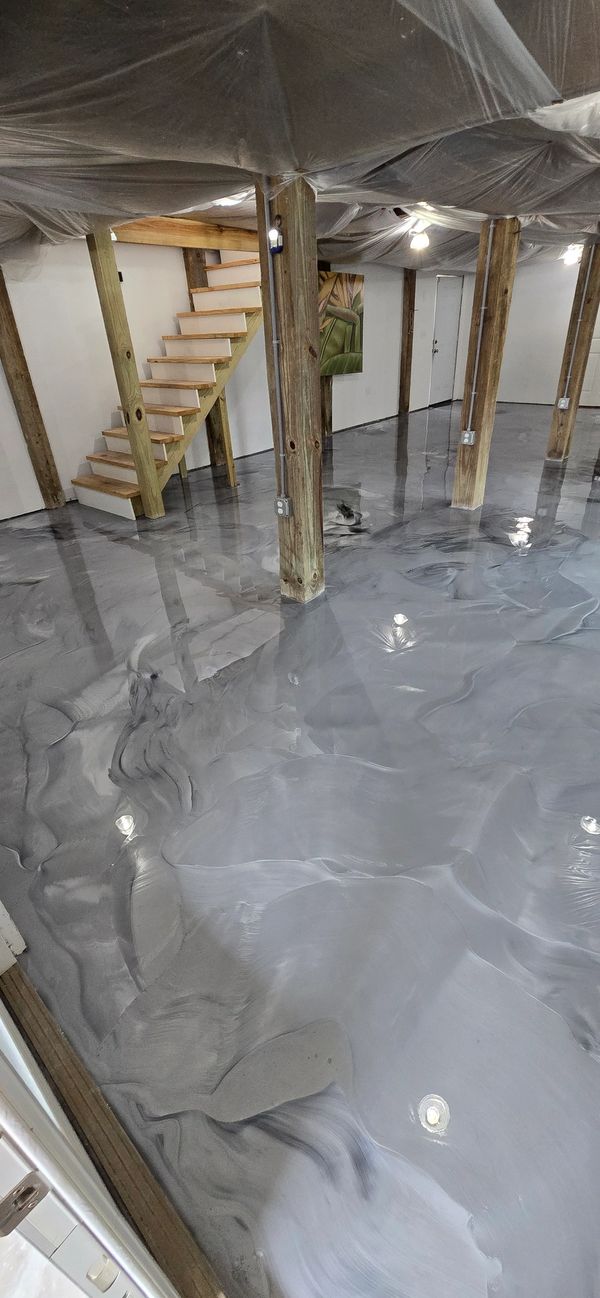 Silver and light grays metallic epoxy floor coating, Cape Coral FL.