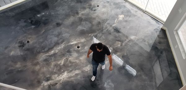 Finished residential metallic epoxy  floor, overhead view in Cape Coral, FL.
