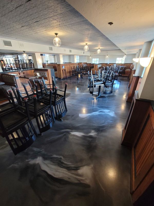 Metallic matte topcoated epoxy floor.