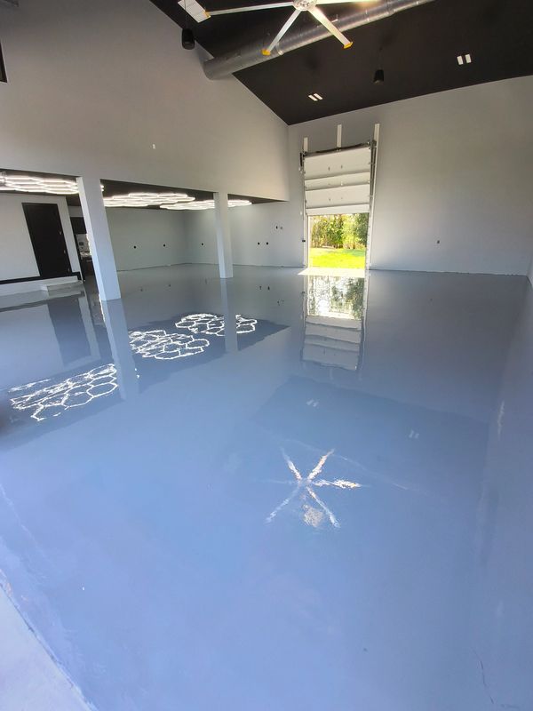 Base coat for a Metallic epoxy floor in residential garage, Southwest Florida
