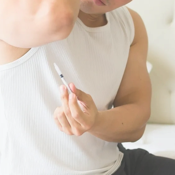 Vitality Wellness Patient injecting Testosterone Treatment