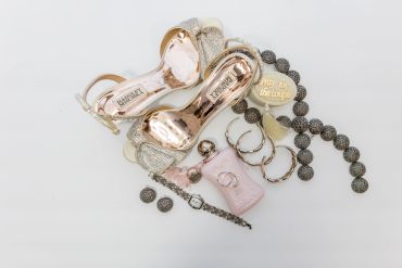 A collection of elegant accessories and high heels.